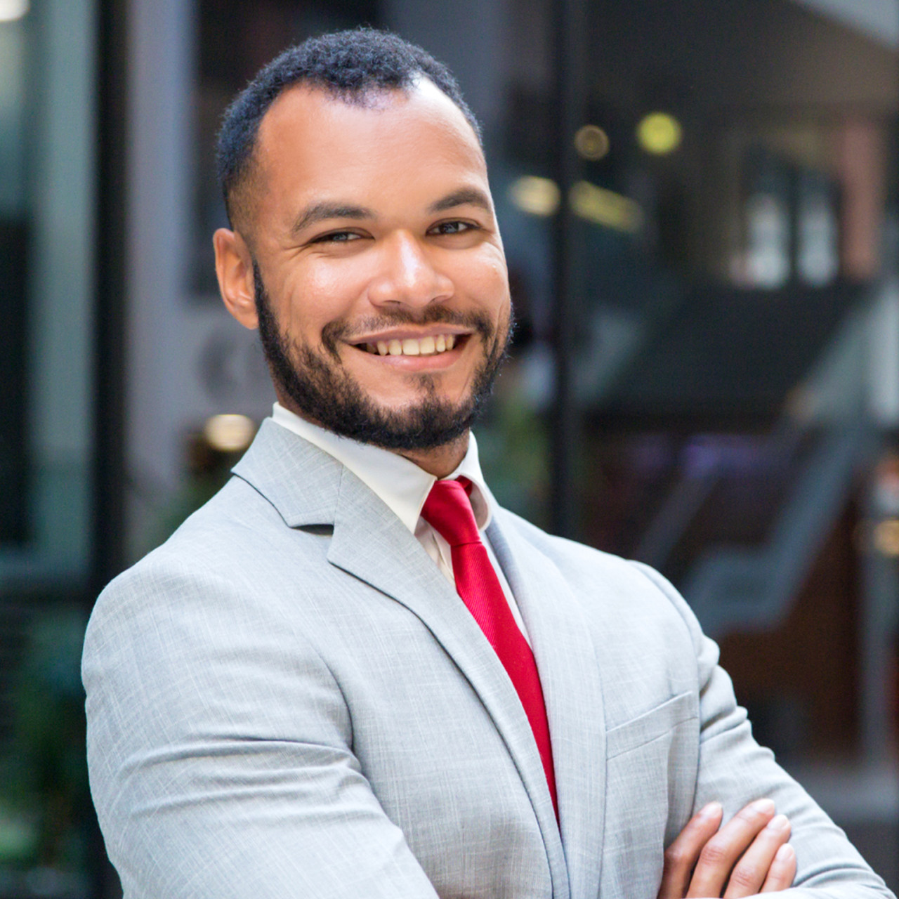 Photo of a smiling businessman.
